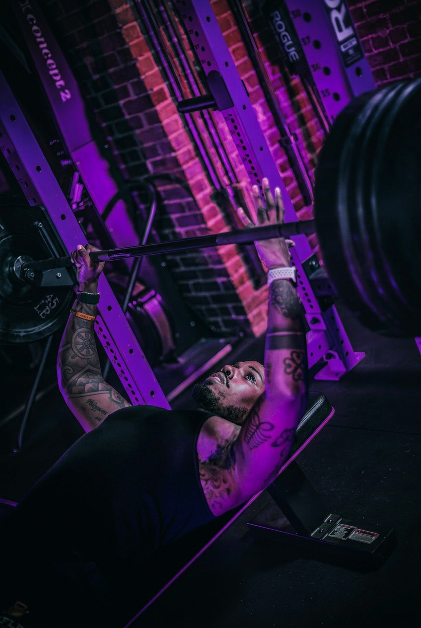 Athlete squatting on the open gym platform